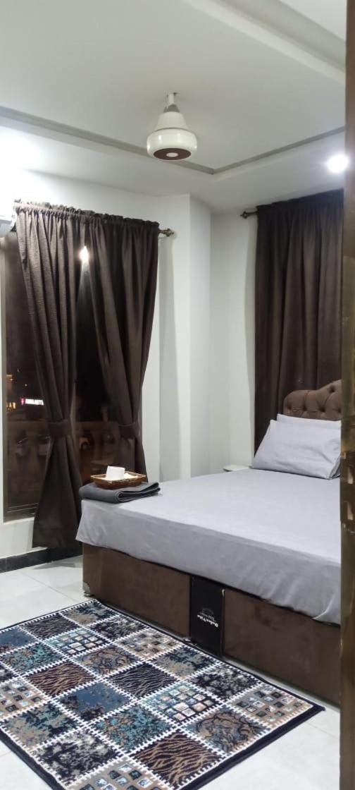 Northern Suites Bahria Town ราวัลปินดี ห้อง รูปภาพ